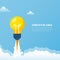 Creative idea. Bright luminous bulb in the form of a rocket flies up with text. Startup, Brainstorm, creating a new concept