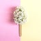 Creative idea: flowers of white lilac on stick like popsicle