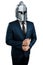 Creative image, a man in a suit of a businessman, a knight`s helmet on his head on a white background. The concept of a modern