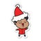 A creative laughing sticker cartoon of a man wearing santa hat