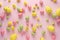 Creative layout with different colorful Easter eggs on pink background. Minimal spring holidays concept