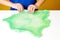 Creative leisure for kids. Stay at home. Family leisure. Kid play with slime at home