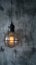 Creative lighting hanging lightbulb on industrial cement background