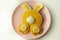 Creative meal for a child, pancake with banana, chocolate and whipped cream in a rabbit shape