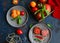 Creative mockup made of fresh colorful tomatoes and fresh basil. Food concept. Top view