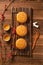 Creative Moon cake Mooncake table design - Chinese traditional pastry with tea cups on wooden background, Mid-Autumn Festival