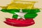 Creative national grunge flag, brushstroke myanmar flag on beige satin, isolated background, concept of politics, global business