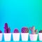 Creative neon background with cactus. Multicolor abstract backdrop with vibrant gradients. Exotic plants with green