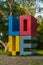 Creative outdoor installation of word love placed in city park