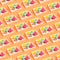 Creative pattern made of colorful macaroons on white wooden tray on orange background. Dessert and confectionary