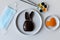 Creative photo about the destructive power of the coronavirus Covid-19 during Easter - a broken Easter bunny made of chocolate