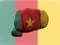 Creative photo of a hand with the national flag of Cameroon