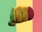 Creative photo of a hand with the national flag of Mali