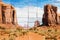 Creative picture of Monument Valley in USA - scenic red landscape with blue sky