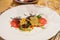 Creative Plate of Beef Carpaccio Salad.