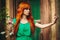 Creative Portrait of Redhead Woman in Green Dress