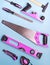 Creative provocation: a set of pink hand tools for construction and repair on a blue background.