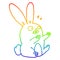 A creative rainbow gradient line drawing cartoon startled rabbit