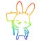 A creative rainbow gradient line drawing curious bunny cartoon with placard