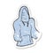 A creative retro distressed sticker of a cartoon hooded top