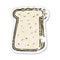 A creative retro distressed sticker of a cartoon slice of toast