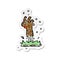 A creative retro distressed sticker of a cartoon zombie hand rising from ground