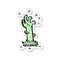 A creative retro distressed sticker of a cartoon zombie rising from grave