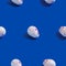 Creative seamless pattern with easter quail eggs on blue background. Abstract background