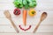 Creative smiling face made from vegetables, Healthy lifestyle co