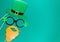 Creative st Patricks Day green background. Flat lay composition of Irish holiday celebration with photo booth decor