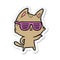 A creative sticker of a cartoon cat wearing cool glasses