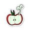 A creative sticker of a cartoon juicy apple half