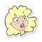 A creative sticker of a cartoon shocked female face