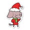 A creative sticker cartoon of a smiling elephant wearing scarf wearing santa hat