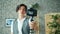 Creative student recording video holding camera talking gesturing at home