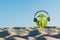 Creative and summer photography of two watermelon in the form of a human head in the glasses in the sand on the beach. Concept