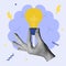 Creative thinking, brainstorm, creative mind concept. Hand holding bulb lamp