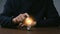 Creative thinking idea for Tecnology concept.Hand of businessman touching light bulb with orange glowing and keyboard.Creative