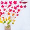 Creative Top view flatlay autumn concept composition. Blank postcards, leaves gradient colorful rainbow fly out of craft paper env