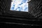 Creative upward shot of stone staircase at Cape Point. Light from upstairs bouncing off of each step.