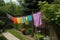 creative use of clothesline to add color and whimsy to outdoor space