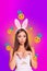 Creative vertical collage poster young charming pretty cute girl pretend be animal rabbit showing demonstrating emoji