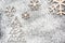 Creative winter snowflakes and fir-tree from powdered sugar Christmas and New Year backgrounds.