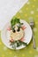 Creatively decorated pig salad. Children`s menu on a green background.