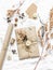 Creativity is a concept. Autumn cozy cute gift packaging in craft paper with natural natural elements - flowers, cones, twigs on a