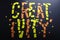 Creativity Paper Cut Ragged Orange Yellow Letters On A Black Craft Paper Background