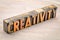 Creativity word abstract in wood type