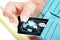 Credit card in woman\'s hand taken out from wallet