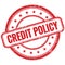 CREDIT POLICY text on red grungy round rubber stamp