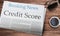 Credit Score headlined newspaper on the table, News Paper\\\'s Name is Braking News